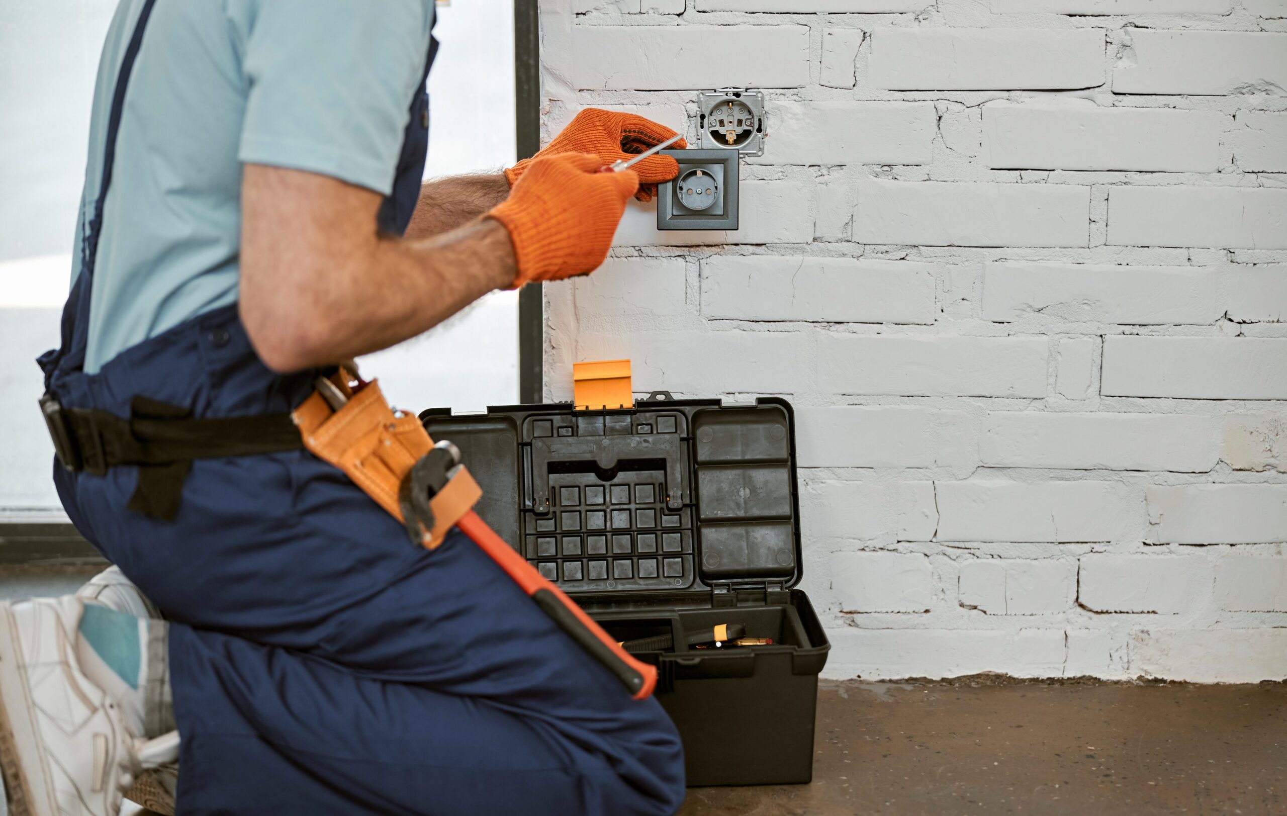 electrician-repairing-power-electric-socket-with-s-2025-03-13-20-26-24-utc 1